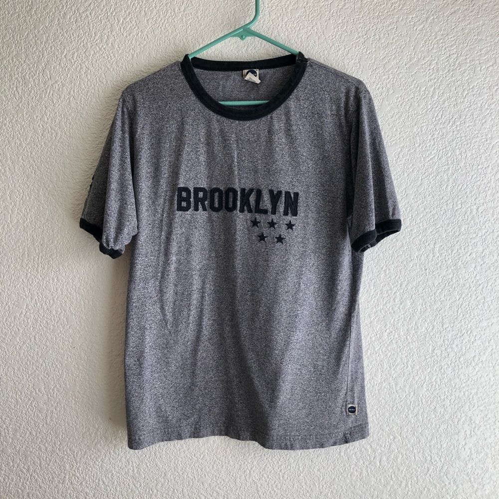 Brooklyn Graphic with Tee emblem on sleeve
